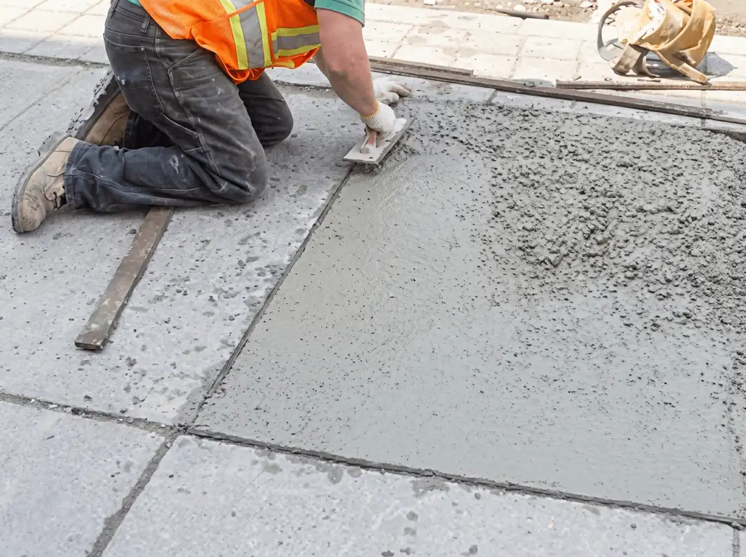 Professional repairing a concrete floor in Savannah, GA