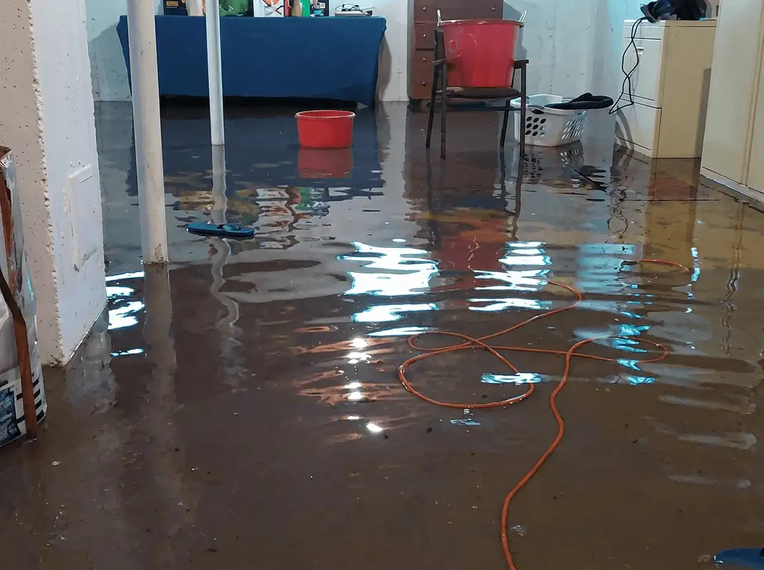 Basement with boiler, cabinets and washing machine completely flooded in Savannah, GA